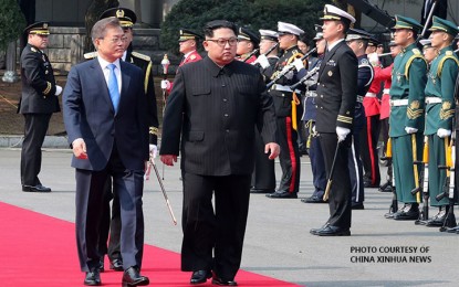 <p><strong>FINALLY.</strong> South Korean President Moon Jae-in (right) and North Korean leader Kim Jong-un (left) finally meet and talk about denuclearization and peace in the Korean Peninsula. The first and historic meeting between the two Koreas' leaders reportedly lasted an hour and forty minutes on Friday (April 27, 2018). <em>(Photo by China Xinhua News)</em></p>